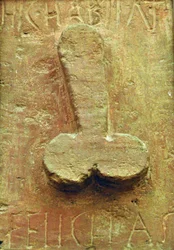 Plaque with phallus surrounded by Latin writings “Hic habitat felicitas”