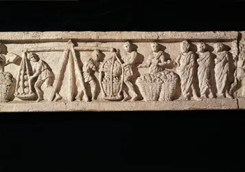 Relief portraying the stacking of loaves in baskets and taking them for weighing