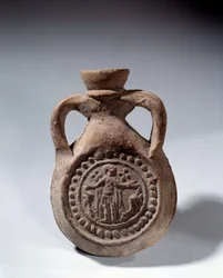 Roman Art: Terracotta eulogy bulb with foot representing a saint. 4th century AD. Paris, Louvre Museum