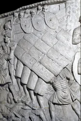 Roman Art: assault of the Romans during the First War. Mould of 1862 reproducing the bas-reliefs of the column of Trajan (Colonna Traiana) in Rome built during the reign of Emperor Trajan (53-117)