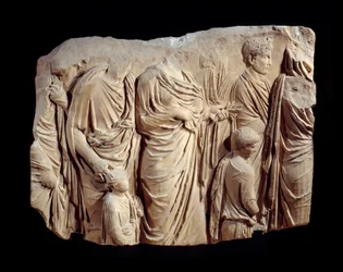 Roman art: fragment of architectural relief in marble from the procession of the Ara Pacis Augustae (altar of peace): procession, during a sacrifice, of figures in toga and children. Around 13-9 BC