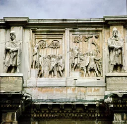 Roman art: low marble relief representing the distribution of subsidies and the surrender of a barbarian leader
