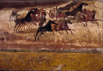 Roman art: race of quadrigas. Fresco from the Villa of the Quadrigas. Fourth Style, Pompeii. Naples, Museo Archeologico Nazionale