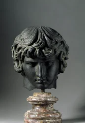 Roman art: representation of Antinous (or Antinoo, c. 110-130), young man and lover of Emperor Hadrian. Bronze sculpture. Florence, Museo Archeologico
