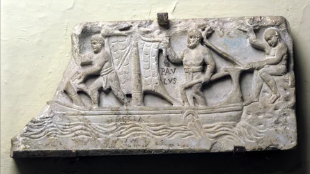 Cover of a sarcophagus with a symbolic representation of a ship named Thecla: Saint Paul holds the rudder and maneuvers the sail