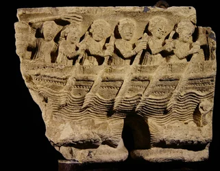 Capital on Twin Columns Depicting Rowers in a Boat