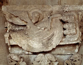 The Magi asleep with an angel awaking them and pointing towards the star of Bethlehem (carved capital)