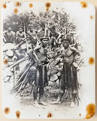 Two Ifugao dressed for the cockfight dance