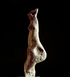 Nuragic culture (nuraghi), Sardinian: limestone statuette of a steatopygous Venus (lower-back form) (Venus of Macomer), from Macomer, near Nuoro. Dating from the pre-Nuragic period (25th-18th century BC), Eneolithic. Cagliari, Museo Nazionale Archeologico