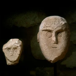 Conic heads, from a funerary monument found in Daunia