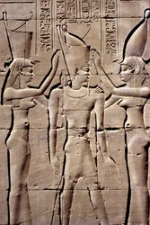 Ancient Egypt, Wall painting/carving, A King receives the double crown from Isis and Nephthys, Temple of Horus, Edfu