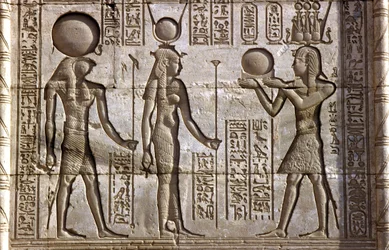 Ancient Egypt, Wall painting/carving, Horus and Isis receive an offering from the pharaoh, Temple of Hathor, Dendera