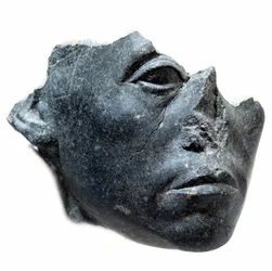 Ancient Egyptian Art: Head of King Sesostris III. Statue fragment. Black granite sculpture, circa 1900 BC (12th dynasty, circa 1963-1786). Paris, Musée du Louvre