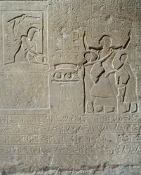 Egyptian antiquity: relief in limestone of Hormin: Sethi I distributes the collars of valour as a reward for his courage to Hormin, head of the king