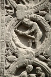Gothic Art: Pieright of the right gate of the western facade of the Basilica of Saint Denis, representing the work of the fields: August. Saint-Denis, France