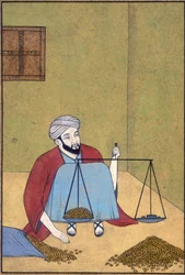 A shroff weighing coins, c.1910