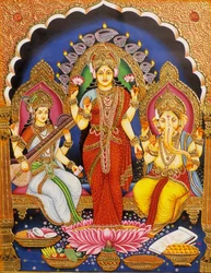 Lord Ganesh with Laxmi and Saraswati