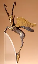Ceremonial handle: winged ibex in silver, inlaid, gold. Achaemenid Persian period (6th-4th century BC), from Iran. Louvre