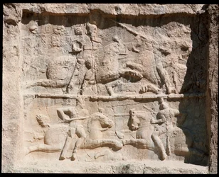 View of the Necropolis and the tombs belonging to Achaemenid kings, relief representing scenes of battle