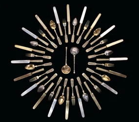 A silver-gilt and niello flatware service