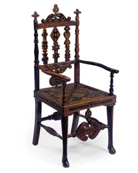 Inlaid and carved open armchair encoded with a patchwork of various phrases, early 19th century