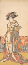 The Third Segawa Kikunojo as a Woman Standing in a Room Having a Wave-pattern Dado