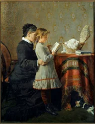 Reading lesson: A nurse teaches a little girl to read