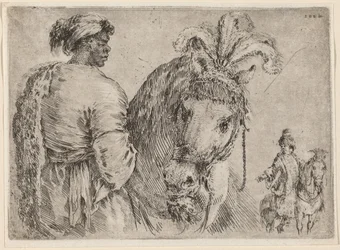 A Black Man Feeding a Horse