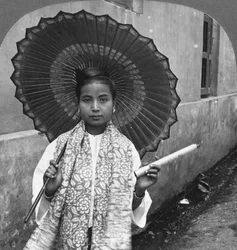 Young Burmese Woman Holding a Huge Cigar, Rangoon, Burma