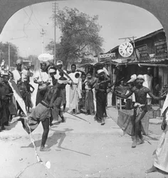 Young Men Performing a Sword Dance, Burma, 1908