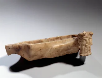 Art of Mesopotamia: Lamp decorated with an androcephal bull (in alabaster) Sumerian period (around 2400 BC). Paris, Musee Du Louvre
