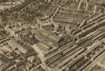 Over Olympia and the Headquarters of the Post Office Savings Bank