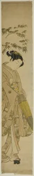 Young Woman Walking in Snow