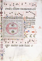 A large decorated initial "E"
