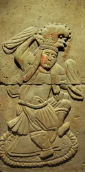 Stele depicting a musician