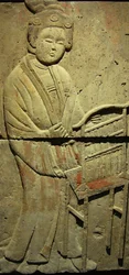 Stele depicting a musician