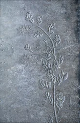 Stele engraved with a chrysanthemum, flowers and leaves, 618-907