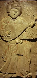 Terracotta stele with musician, Tang Dynasty (618-907), discovered in Shaanxi Province, Steles Forest Museum in Xian. Photography, Leonard de Selva, China, 2006.