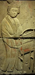 Terracotta stele with musician, Tang Dynasty (618-907), discovered in Shaanxi Province, Steles Forest Museum in Xian. Photography, Leonard de Selva, China, 2006