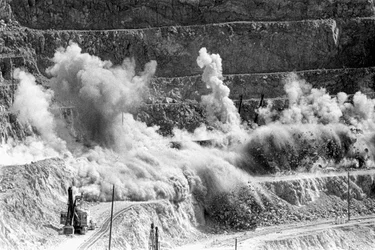 Blasting with dynamite at open pit copper mine Morenci mine for Phelps Dodge Smelter Douglas Arizona