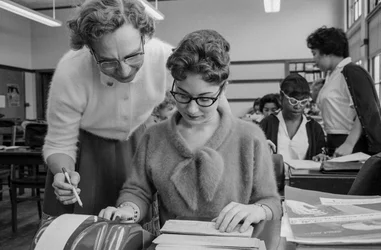 Teacher and female student in an accounting class at James A. Garfield High School