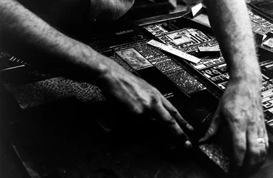 Typesetter sets cold type from linotype machine for the Frontiersman newspaper