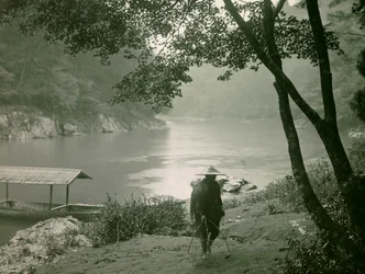 Fisherman by the Hozu River, Arashiyama District, Kyoto, circa 1900 - 1915