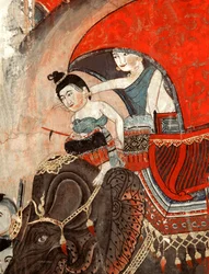 A Princess and attendant riding an elephant