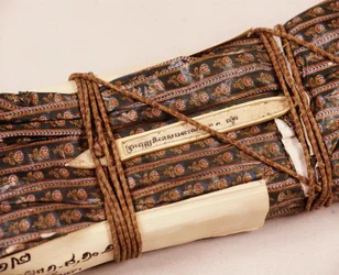Buddhist Manuscript, Wrapped in Waxed Cloth for Protection