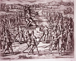 The Inca king, Atahualpa, holding a scepter in the shape of a sun, is carried on a litter to meet Francisco Pizarro (Engraving)