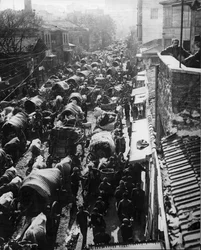 Refugees stream into Constantinople, waiting for a ship to Asia during the Turkish Revolution, 1909