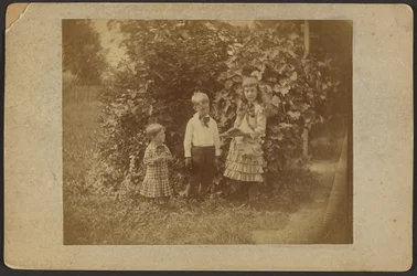[Three children]