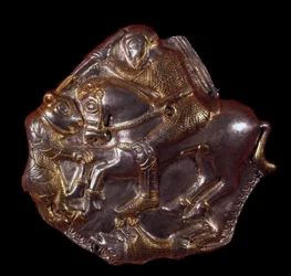 Thracian civilization: gold silver sconce representing a rider attacked by a bear. 400-350 BC. Lovtch, Historical Department Museum, Bulgaria