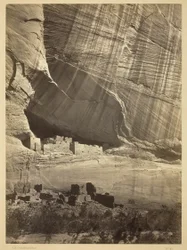 Ancient Ruins in the Canyon de Chelly, N.M. In a niche 50 feet above present Canyon bed.